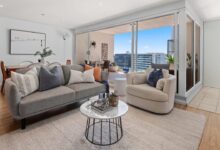 Three-bedroom apartment at 1004/489 Hunter Street breaks building record at $900,000, with Jarrod Dickens securing pre-auction sale.