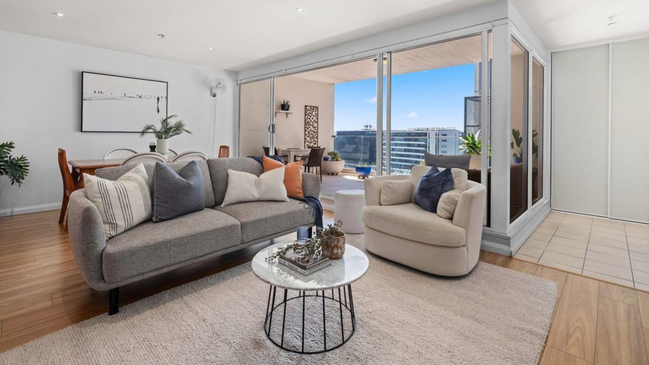 Three-bedroom apartment at 1004/489 Hunter Street breaks building record at $900,000, with Jarrod Dickens securing pre-auction sale.