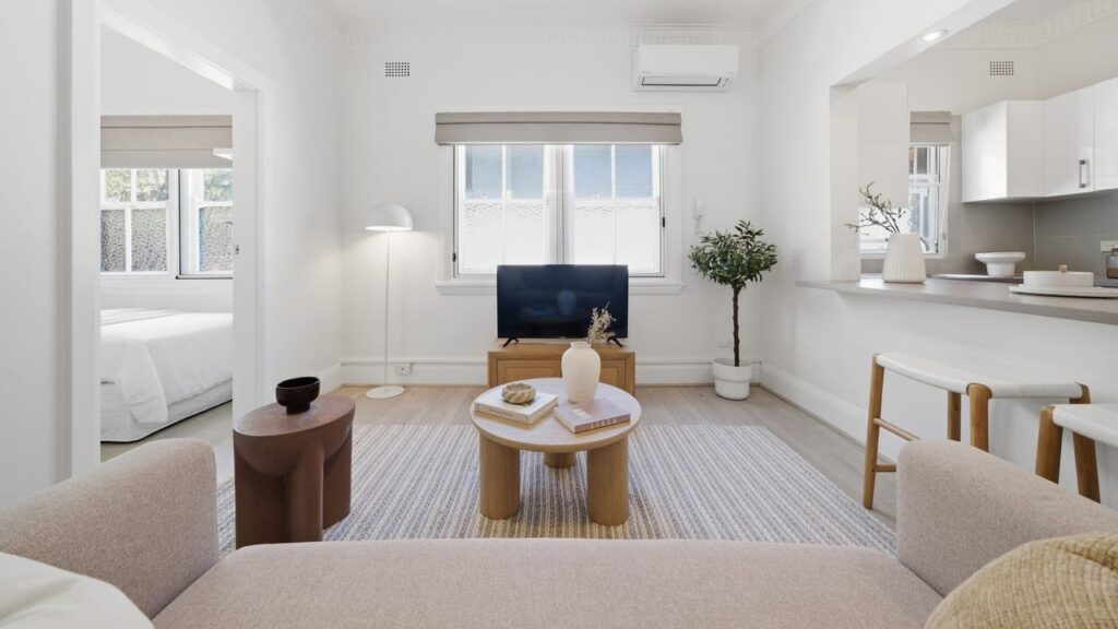 Nicholas Armstrong-Smith of Century 21 Armstrong-Smith achieves $975,000 for a two-bedroom Bondi Junction apartment through strategic presentation and local market strength.