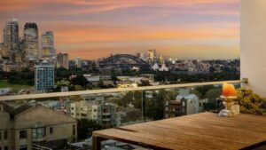 Interstate investor claims Darlinghurst apartment with harbour views after a campaign that attracted 243 potential buyers