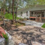 11 encumbrances. Battle-axe block. Protected trees everywhere. Sold in 22 days.