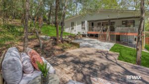 11 encumbrances. Battle-axe block. Protected trees everywhere. Sold in 22 days.