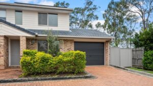 Petrie duplex hits street record despite neighbour's Michael Myers open home threats