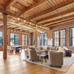 NBA star Jaylen Brown re-lists his Fort Point penthouse and adjacent studio for A$7 million. Photo: sarkisboston.com