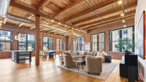 NBA star Jaylen Brown re-lists his Fort Point penthouse and adjacent studio for A$7 million. Photo: sarkisboston.com