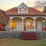 A historic 1907 beachfront estate in Sumner, Christchurch, hits the market after 33 years of ownership by Rick and Catherine Wilkie. Image: rwmetro.co.nz