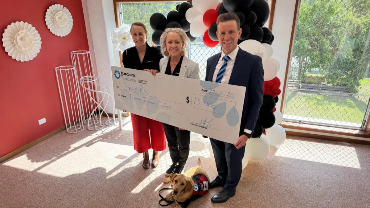 Harcourts Foundation $13,000 donation to Smart Pups. Photo supplied (AI Expanded)