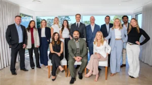 Directors Michael Ferguson, Lachelle Ferguson and Kathleen Fairweather are transitioning their business to LJ Hooker, with offices in Forestville and Narrabeen. Image: Supplied
