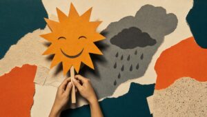 Hand-cut paper collage of hands holding up a smiling paper sun mask beside a grey rain cloud, in teal and burnt orange