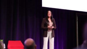 Sophie Kennedy-Rush speaking at PM/ONE 2026