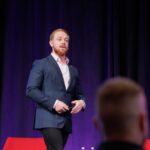 Naaman Fraser speaking at PM/ONE 2026