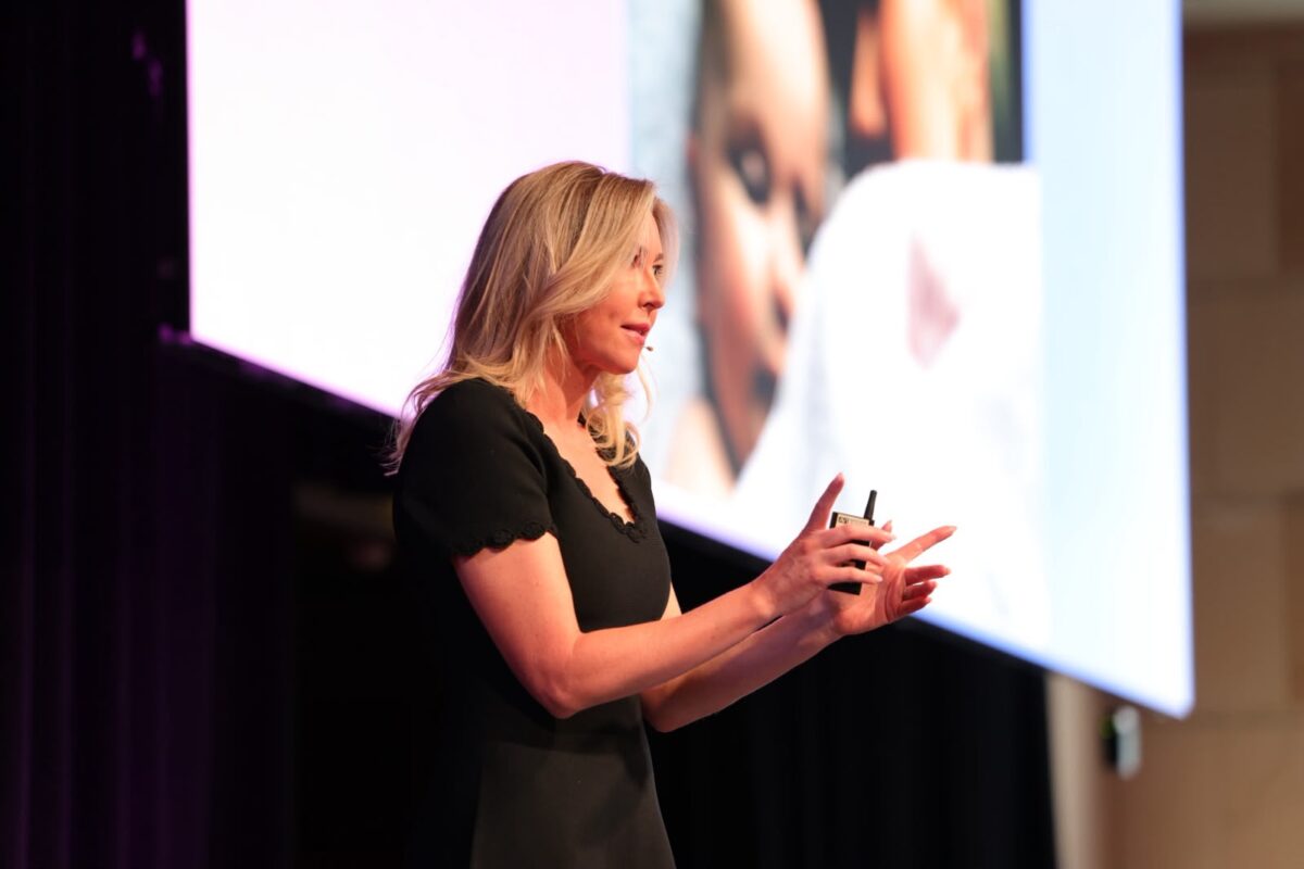 Chelsea Pottenger speaking at PM/ONE 2026