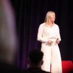 Pamela Medeiros speaking at PM/ONE 2026