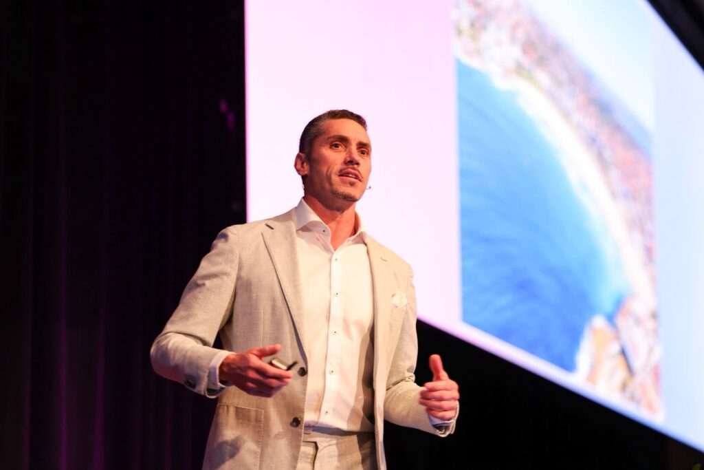 Quinn Darragh speaking at PM/ONE 2026