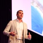 Quinn Darragh speaking at PM/ONE 2026