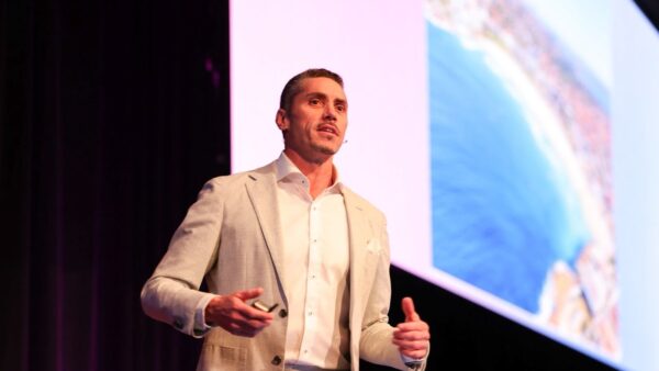 Quinn Darragh speaking at PM/ONE 2026