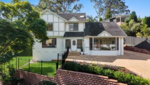Local upsizers secure lake-view Eleebana home after garage conversion creates family showpiece