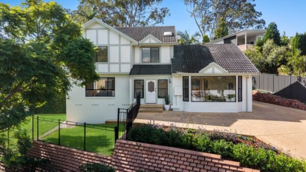 Local upsizers secure lake-view Eleebana home after garage conversion creates family showpiece